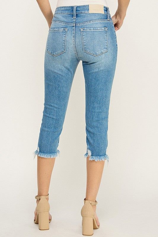 Details Style No. AT1101CKBU Elevate your denim game with the Mid Rise Capri featuring a frayed hem and distressed details. Designed specifically for plus-size figures, these capri jeans offer both style and comfort, making them a must-have addition to your wardrobe. Highlights Super Stretchy Denim Comfort High Quality Material Capri Length Mid-rise design Frayed with Distressed Medium Stone Wash Exposed Button Shape & fit • Skinny fit • Mid rise • Frayed HemSpecifications: Front Rise: 9 inches Frayed Hem Jeans, Hem Jeans, Capri Jeans, Vintage Jeans, Must Haves, Mid Rise, Capri, Jade, Highlights