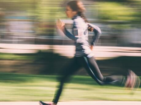 a blurry photo of a person running