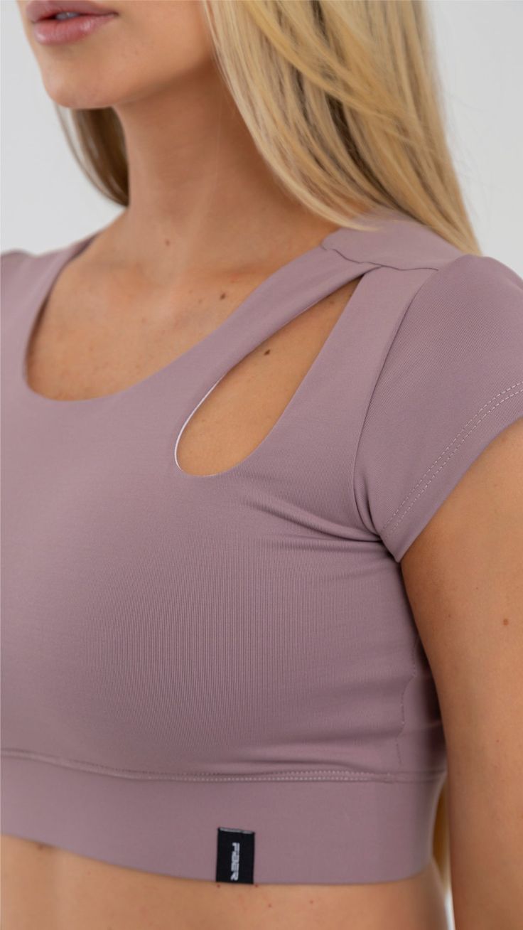 Currently obsessing over this crop top. Cropped length for easy pairing with high rise leggings.Designed for your effortless gym to street looks! Made in Colombia, 100% Authentic Tight fit for a body-hugging feel Machine wash Compression Scoop Neck Tops For Pilates, Trendy Workout Crop Top Activewear, Compressive Scoop Neck Crop Top For Workout, Compression Workout Crop Top, Trendy Crop Top Activewear For Workout, Trendy Solid Color Sports Crop Top, Scoop Neck Athleisure Tops For Pilates, Stretch Crop Top For Light Exercise, Trendy Sports Crop Top With Medium Support