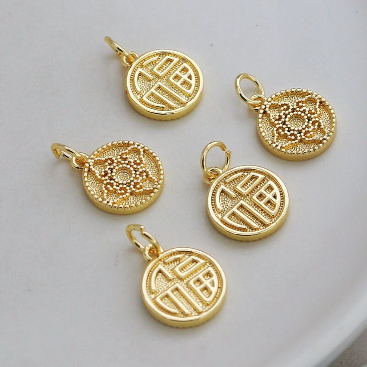 Material: Brass Description High quality 14K gold plated brass, color not easily tarnish Size: 13mm, thick 2.1 mm Quantity: 5 pcs. Color: 14K gold Material: 14K gold plated brass ❤ More pendants items here: ❤ https://www.etsy.com/hk-en/shop/basicDIYcraftstore?ref=simple-shop-header-name&listing_id=806990990&section_id=29121362 ❤ More other items here: ❤ https://www.etsy.com/shop/basicDIYcraftstore?ref=simple-shop-header-name&listing_id=823835581 Shipping Following is the place that o Gold Medallion Charms With Coin Pendant, Gold Coin Pendant Charms, Gold 14k Round Pendant Charms, Gold Charm Necklace With Medallion, Gold Round Pendant Charms That Are Tarnish Resistant, Gold Round Pendant Charm In 14k, Gold Tarnish-resistant Round Pendant Charm, Gold-tone Round Charm Necklaces, Tarnish Resistant Gold Plated Round Pendant Charms