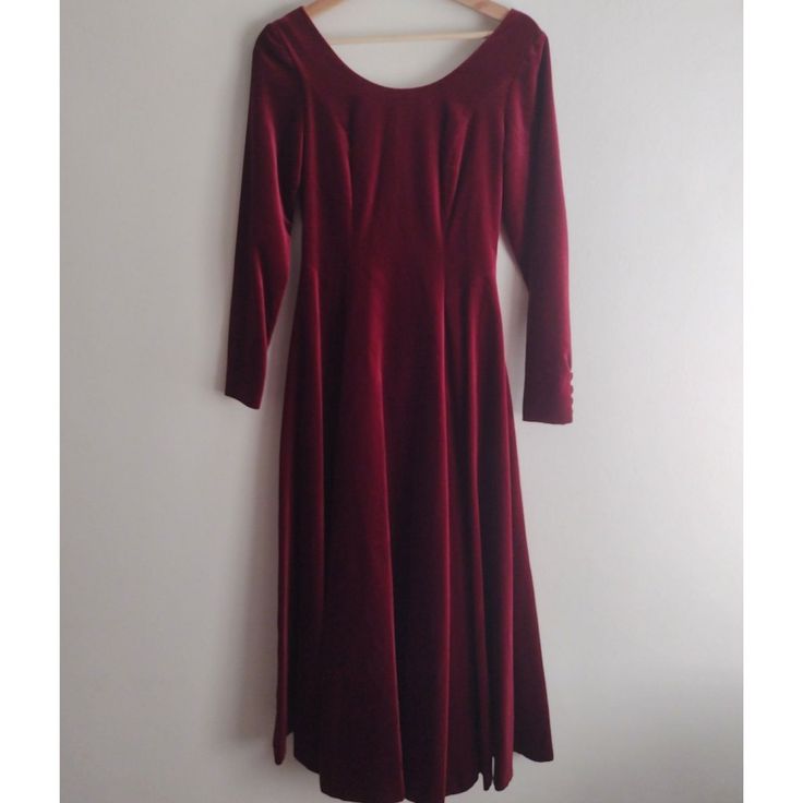 Laura Ashley Velvet Maxi Dress 6 Red Long Sleeves Button Back Evening Party Gown Gorgeous Piece! Stunning In Person Dark Red Velvet With A Fitted Top And Flared Maxi Skirt Princess Seams For A Feminine Fit Accented With Covered Buttons On The Back Scoop Neck And Scoop Back Long Sleeves Velvet 73% Cotton 27% Viscose Size: Us 6 Uk 10 Excellent Condition, Please See Pics For Details. Small Mark On Bodice Bust: 16'' Waist: 13'' Length: 53'' Always Happy To Make A Deal If You Want More Than One Item! Thx And Happy Poshing! Party, Wedding, Prom, Party Red Buttoned Midi Dress For Party, Long Sleeve Maxi Dress With Buttons For Party, Long Sleeve Buttoned Maxi Dress For Party, Fitted Evening Dress With Buttons, Evening Midi-length Dresses With Buttons, Classic Evening Dresses For Winter, Red Party Dress With Button Closure, Fitted Burgundy Dress For Christmas, Burgundy Formal Dress For Christmas