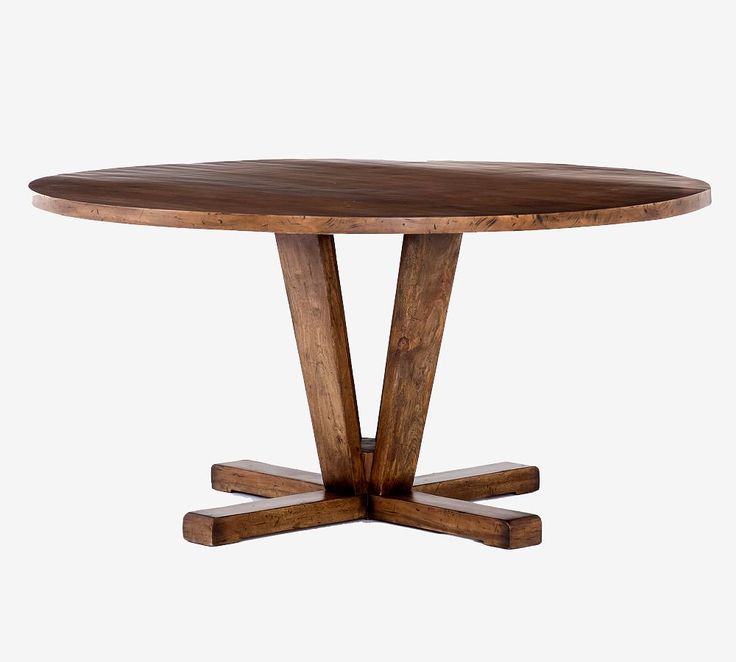 a round wooden table with four legs and a circular wood dining table top, viewed from the front