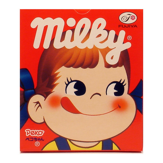 a close up of a box of milky with a child's face on it