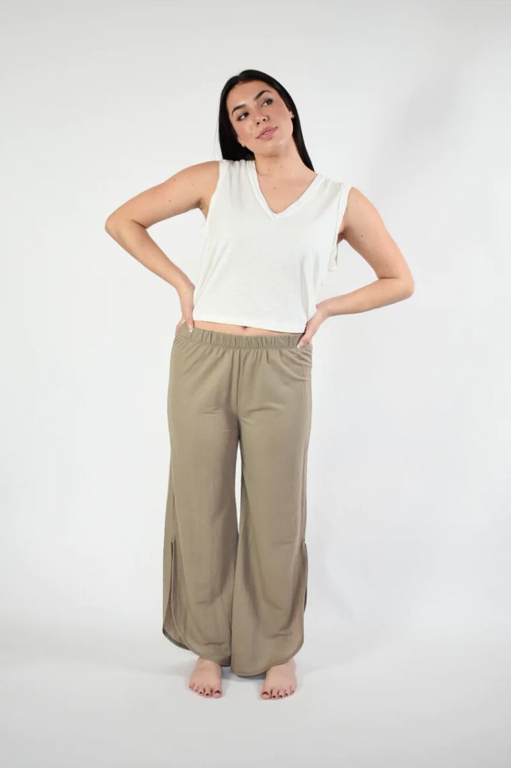 The chicest pair of lounge pants around! Our Casey lounge pants take your loungewear to the next level. Soft, comfortable, and so easy to style - everyone needs a pair of these. The lounge pants are comfy and cute making the perfect casual outfits. Features: Curve Hem Elastic Waist Model is wearing a medium. Height 5'8", Bust 35", Waist 28.5", Hip 34.5" Fabric content: 45% Nylon : 55% Rayon Versatile Loose Fit Harem Pants For Loungewear, Versatile Harem Pants For Loungewear, Effortless Summer Loungewear Wide Leg Pants, Effortless Summer Loungewear Pants, Athleisure Harem Pants For Loungewear With Relaxed Fit, Effortless High-waisted Loungewear Pants, Chic Lounging Bottoms With Elastic Waistband, Effortless Wide Leg Loungewear Bottoms, Effortless Summer Loungewear Bottoms