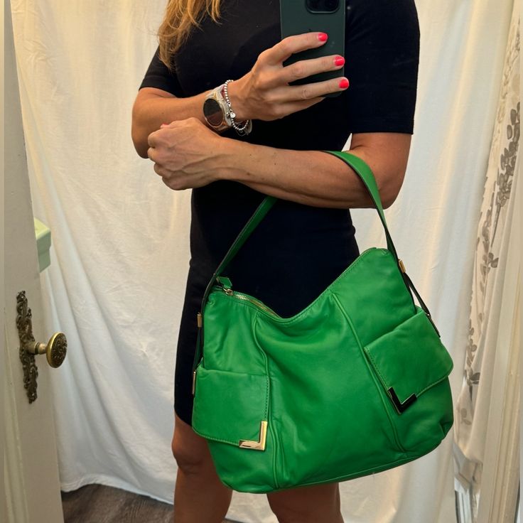 Beautiful Michael Kors Shoulder Bag In Bright Green Color. I Worn It Maybe Twice, It Is In Like New Condition. Only Flaw Is Missing A Stitches On One Of The Pocket As Pictures Shown, But You Can’t Really See It Till You Pull The Pocket. I Never Noticed Till Now I Was Taking A Pictures. :( Designer Green Shoulder Bag For Travel, Michael Kors Everyday Tote Satchel, Designer Green Satchel For Everyday, Designer Green Everyday Satchel, Michael Kors Rectangular Satchel With Handle Drop, Green Soft Leather Satchel For Office, Michael Kors Satchel Shoulder Bag With Handle Drop, Michael Kors Shoulder Bag With Removable Pouch For Shopping, Michael Kors Satchel Shoulder Bag For Shopping