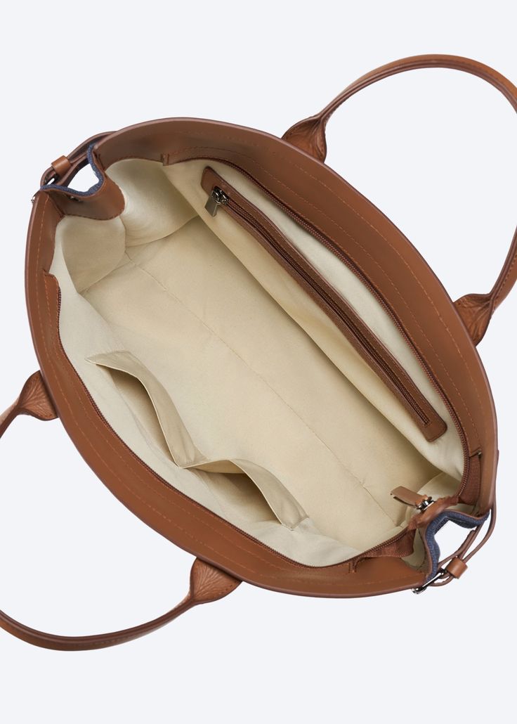 Practical, stylish and flexible, this two-strap bag can be used as a crossbody bag or a stylish canvas tote. Inspired by the Cote D’Azur, this elegantly simple bag is perfect for strolling down Cannes’ unofficial style catwalk, La Croisette. Available in beige, olive and navy. Measurements 14.3" (length) x 11.3" (height) x 4.3" (width) Hand Made With Love Handcrafted and made in Spain 100% organic canvas Premium leather Easy Care Use damp cloth with cold water and let air dry Simple Bag, Strap Bag, Canvas Handbags, Simple Bags, Handbag Straps, Women Men Shoes, Trending Today, Bag Straps, Cannes