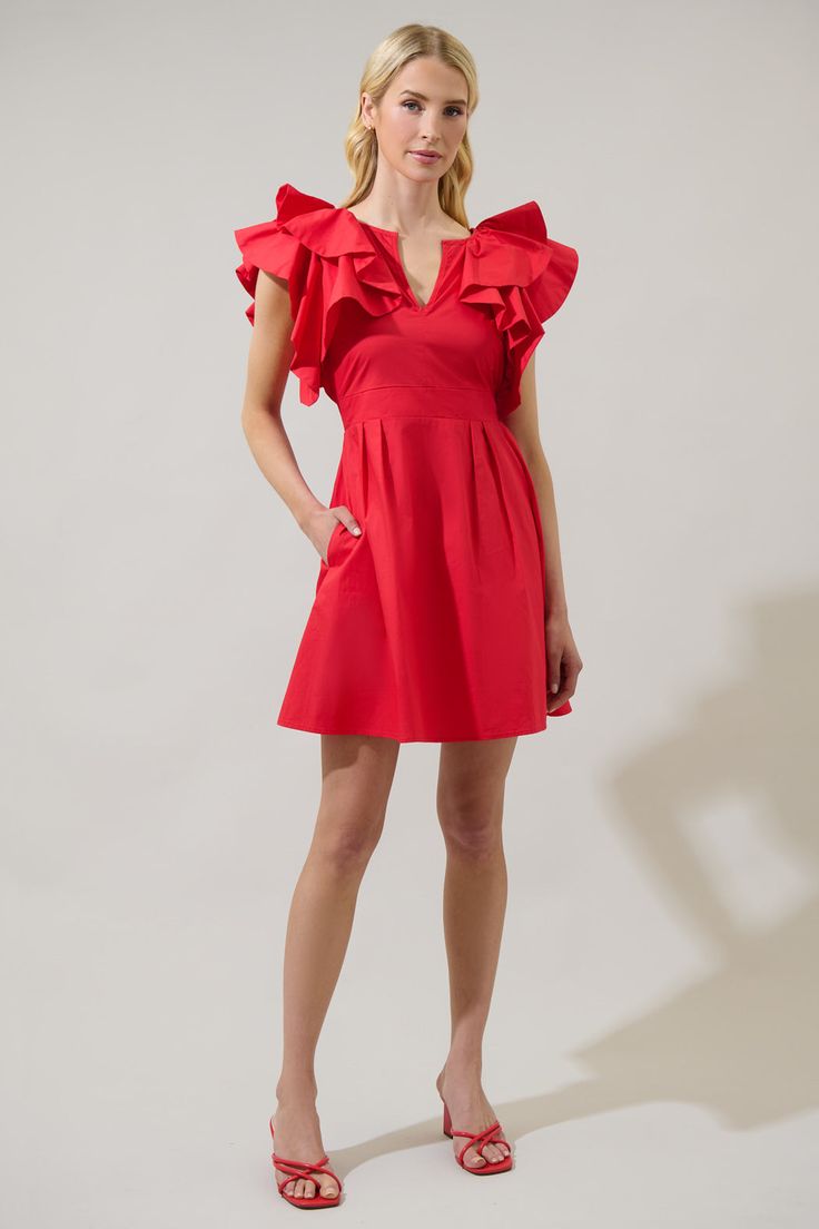 Make your day date extra cute with the Wilma Ruffle Mini Dress! Layered ruffles on the shoulders are followed by a split neckline. The smocked waistband and back tie make it easier to get in and out. Pair it with strappy heels and a wide sun hat for an effortless summer look.- Ruffles- Split neck- Pockets- Smocked- Comes in 2 colorsSize + Fit - Model is 5'8" and wearing size XS- Measurements taken from size S - Chest: 17 3/4"- Length: 35 1/2" Fabric Self:100%Cotton Style Number STD14197SDR Chic Mini Dress With Elastic Shoulders, Chic Ruched V-neck Ruffle Dress, Spring Ruffle Sleeve Dress With Smocked Back, Feminine Dress With Smocked Back And Ruffle Sleeves, Elegant Spring Ruffle Dress With Smocked Back, Elegant Ruffle Dress With Smocked Back For Spring, Chic Mini Dress With Ruffled Straps For Brunch, Chic Mini Dress With Elastic Shoulders For Brunch, Chic V-neck Ruffle Dress