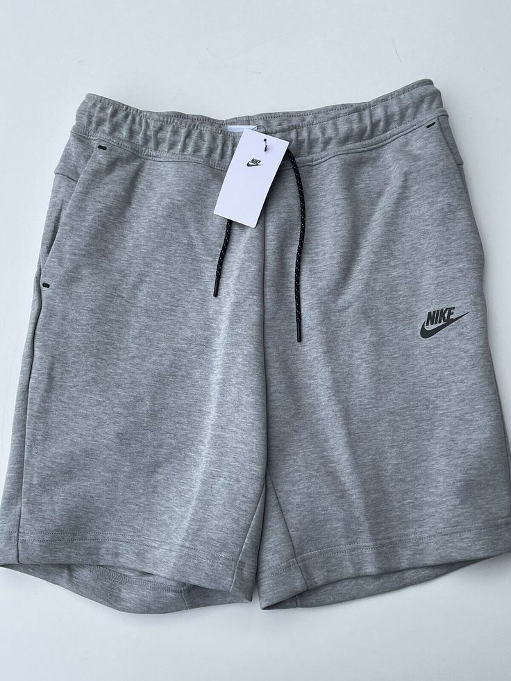 Nike Tech Fleece Shorts are new with tags and 100% authentic. Gray Jogging Shorts, Gray Sportswear Shorts For Jogging, Nike Sports Shorts With Side Pockets, Nike Sportswear Shorts With Side Pockets, Nike Sports Shorts In Gray, Nike Gray Sports Shorts, Sportswear Jogging Shorts With Pockets, Gray Sportswear Shorts With Pockets, Sportswear Bottoms With Pockets For Sports Events