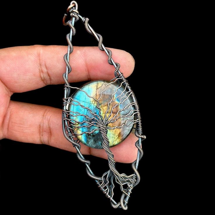 This listing is for Labradorite Wire Wrapped Pendant , Copper Wire Wrapped Pendant , Labradorite Gemstone Jewelry Gift For , Gift For Mom ,Jewelry Labadorite  Material :- Copper / Gemstone  Gemstone :- Labradorite    ----------------------------------A perfect gift --------------------------------------------------- Height :- 10 cm Tree Of Life Wire, Labradorite Necklace, Labradorite Necklaces, Mom Jewelry, Boho Gifts, Jewelry Boho, Jewelry Unique, Unique Gemstones, Wrapped Pendant