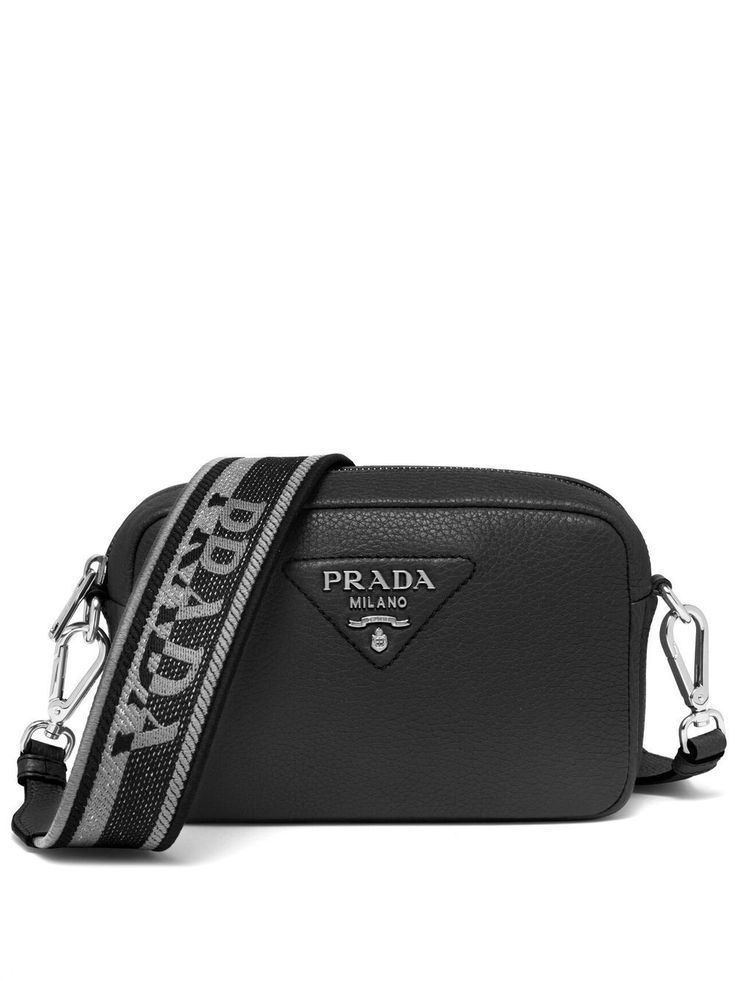 black leather two adjustable detachable shoulder straps triangle logo silver-tone logo lettering top zip fastening partitioned compartment High-end Leather Shoulder Bag With Logo, Luxury Crossbody Shoulder Bag With Logo, Black Luxury Shoulder Bag With Logo Strap, Luxury Black Bags With Logo Strap, Luxury Black Shoulder Bag With Logo Strap, Luxury Rectangular Shoulder Bag With Logo Strap, Business Crossbody Shoulder Bag With Logo Hardware, Modern Travel Shoulder Bag With Logo Strap, Luxury Shoulder Bag With Silver-tone Logo Plaque