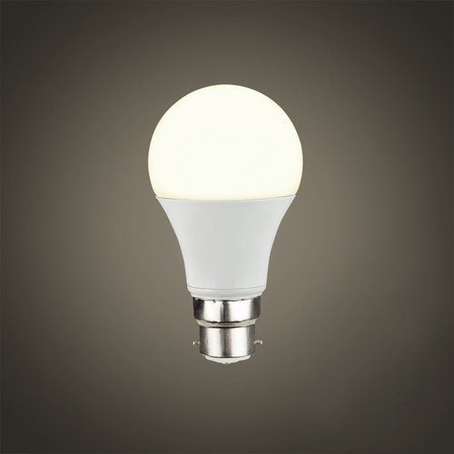 a white light bulb on a brown background