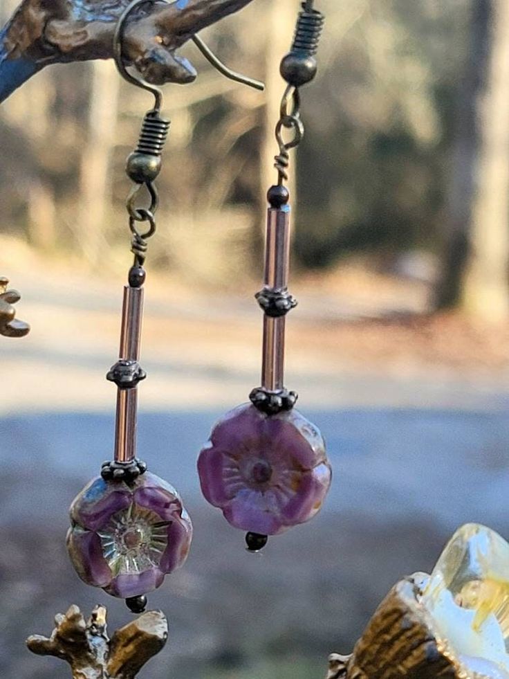 Boho Lavender Purple Drop Earrings are lightweight and comfortable.  Personally designed and hand-made using premium Czech Glass beads. It's such a lovely shade of lavender in these beautiful flowers with a satin edge. Earwires are lead-free and nickle free and hypoallergenic. Gift wrapping available and special orders are welcome. Please stop by my Etsy shop to see over  500 listings of personally designed and hand-made hair accessories and jewelry items. Elegant Purple Flower Earrings With Handmade Flowers, Elegant Purple Handmade Flower Earrings, Elegant Adjustable Purple Flower Earrings, Handmade Adjustable Lavender Earrings, Purple Flower-shaped Jewelry With Handmade Flowers, Handmade Vintage Purple Flower Earrings, Purple Flower Bohemian Earrings, Purple Flower Jewelry With Handmade Flowers, Purple Flower-shaped Handmade Jewelry