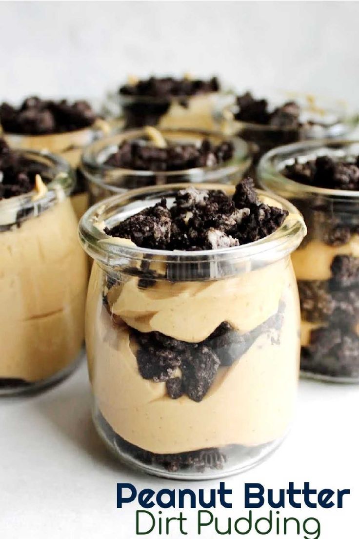 four desserts in small glass jars with chocolate chips