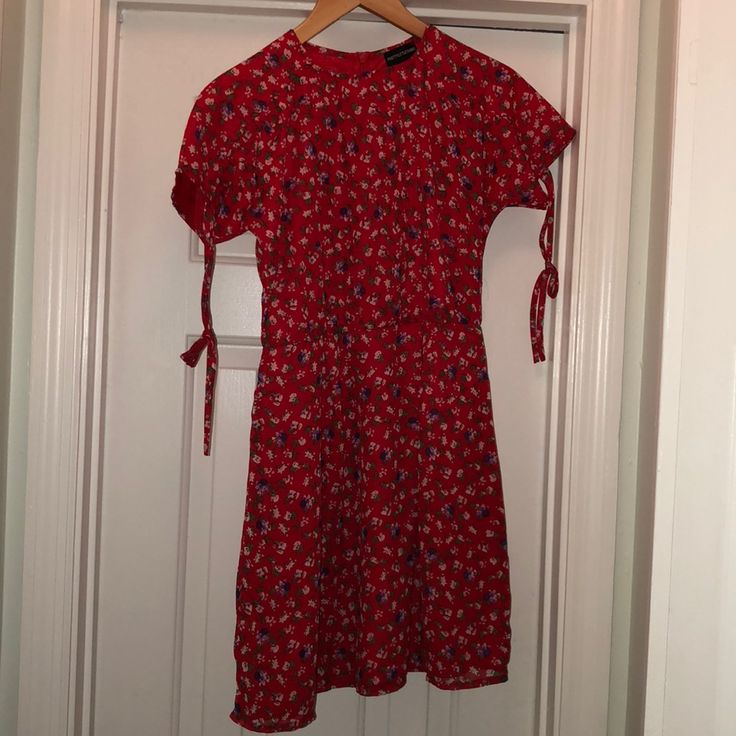 Very Cute, Light Weight Red Dress! Has A Hidden Zipper, Cute Ties On The Sleeves, And Slightly Flares Out At The Bottom. Never Worn! Bought This From Asos, So The Size 6 Fits Like A Small. I Usually Wear A 2-4 And It Fits Perfectly! Red Floral Print Mini Dress For Casual Occasions, Red Short Sleeve Midi Dress For Daywear, Casual Red Midi Dress For Dress Down Days, Casual Red Midi Dress For Dress Down Occasion, Red Casual Midi Dress, Red Floral Print Midi Dress For Daywear, Red Fitted Mini Dress For Daywear, Red Floral Midi Dress For Daywear, Fitted Red Mini Dress For Daywear