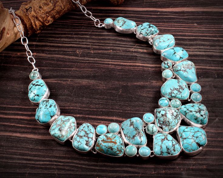 Stone : Rough Turquoise (color enhanced). Please note : As this stone is of unusual shape and color, every stone is different. so, the product you get in hands may slightly vary from the picture shown and not exact same as picture . And this is the beauty of each necklace being different than other. If any query, feel free and contact me. Crafted with the help of trained and experienced artisans team , our products are handmade with quality gemstones. I take care of perfect balance of combinatio Unique Turquoise Gemstone Necklace, Distinctive Turquoise Gemstone Necklace, Unique Turquoise Cabochon Necklace, Turquoise Cabochon Chrysocolla Necklace, Artisan Turquoise Stones Necklace, Unique Turquoise Necklace With Large Stone, Turquoise Chrysocolla Stone Necklaces, Unique Turquoise Chrysocolla Necklace, Turquoise Chrysocolla Necklace With Stones