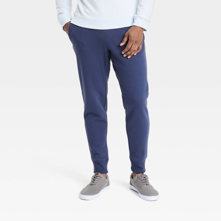 Why we're ALL IN: Regular-fit joggers in midweight fleece fabric for indoor and outdoor workouts. Side pockets for stashing go-to essentials, an elasticized waistband with a drawstring for a customizable fit and ribbed ankles to keep out the cold. All in Motion™: Made for every move, priced for every day. Navy Sporty Sweatpants With Elastic Waistband, Sporty Navy Sweatpants With Elastic Waistband, Navy Sporty Joggers For Loungewear, Sporty Navy Joggers For Loungewear, Navy Cotton Sweatpants Sportswear, Sporty Navy Cotton Joggers, Navy Cotton Athleisure Joggers, Navy Cotton Sweatpants For Sports, Navy Cotton Jogging Bottoms