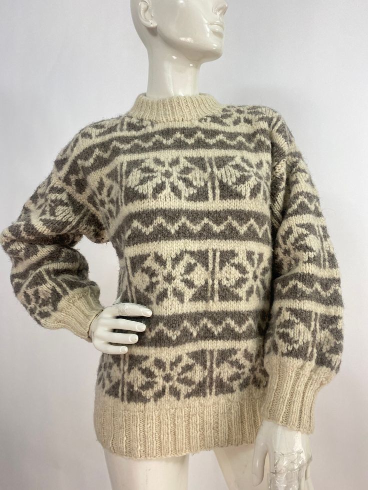 "Vintage wool sweater, thick pure wool sweater, fits like a women's small/medium Measurements:  Shoulder 17\"-18\"/sleeve 22\"/bust(pit-pit)21\"/bottom width 16\"-25\"/length 24\" Mannequin measurements:  5'8\", bust 34\", waist 25\", hip 33\" Please note that vintage clothing sizes can vary greatly.  The Measurements provided  are approximate and are taken lying flat.  I suggest taking a similar garment from your wardrobe and measure it while lying flat.  This way you can compare measurements.   Don't forget to enlarge the photos and take a closer look at this genuine vintage item!! I will ship your item off within 1-2 business days. I ship expedited for all Canadian and US orders. All other destinations world wide will be shipped surface and therefore may take 4-6 weeks or longer unless