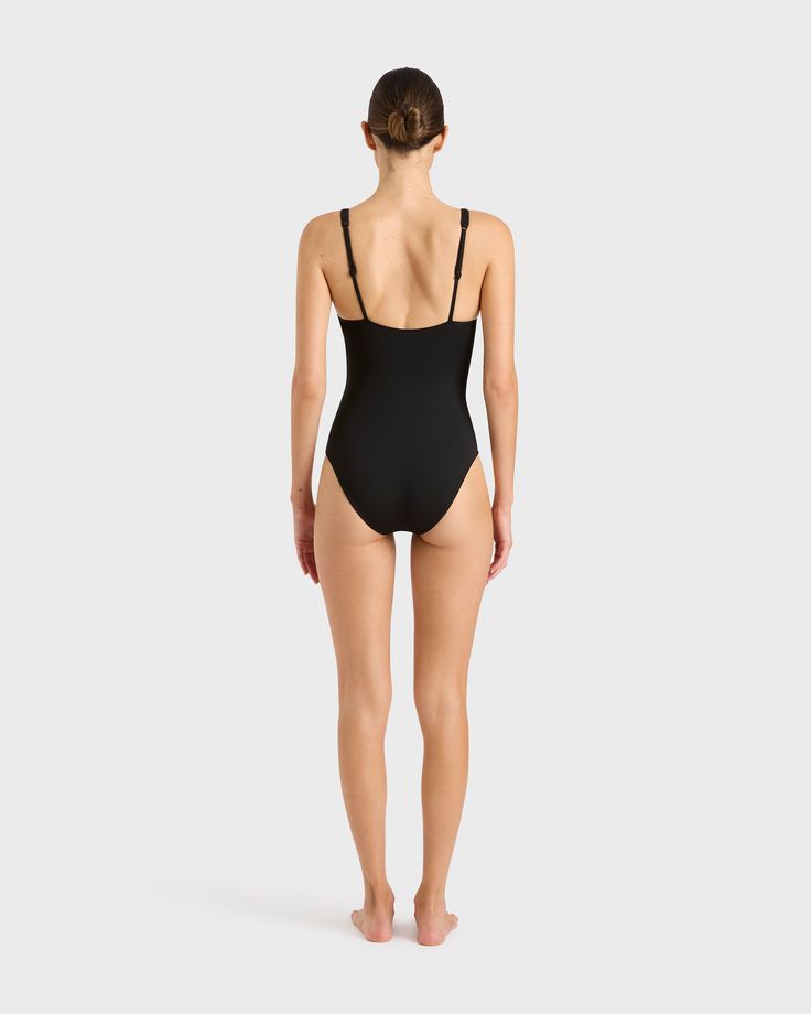 Emmanuelle is a modern classic that will become the go-to piece in your swim wardrobe now and for many years to come. Featuring a flattering plunge neckline, supportive underwire and wide, adjustable shoulder straps, this elegant piece ticks all the boxes - stylish, supportive and supremely comfortable. Made from our technically advanced Singuleur® fabric, that moves on the body like a second skin, Emmanuelle features a medium-high cut leg and medium rear coverage and is suitable for bust sizes Designer Swimsuit, Swimsuit Design, Sustainable Swimwear, Plunge Neckline, Australian Design, Ticks, High Cut, Plunging Neckline, Second Skin