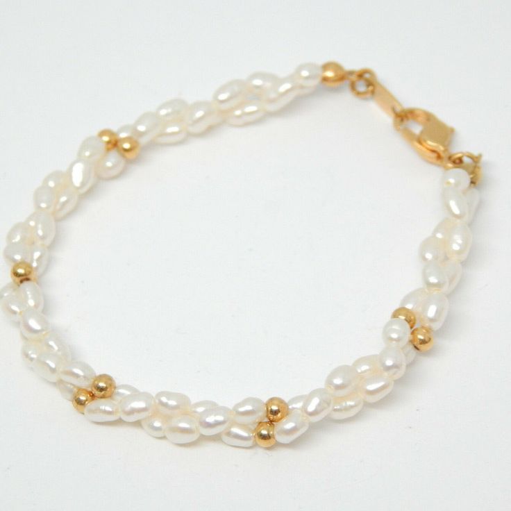 PERFECT FOR A 6 INCH WRIST OR SMALLER-Vintage 1980s Rise Pearl Twist And Goldtone Bead 6.5 Inches Long Delicate Bracelet, Wedding Gift, For Her, Birthday, Pearl Gift, Pics-More Treasures Here- https://www.etsy.com/shop/TreasureFoundToShare Vintage White Pearl Bracelet For Anniversary, Vintage Pearl Bracelet With Round Beads For Wedding, Adjustable Vintage Beaded Bracelet For Wedding, Vintage Gold Beaded Bracelets For Wedding, Vintage Gold Beaded Wedding Bracelets, Vintage Gold Beaded Wedding Bracelet, Vintage Beaded Bracelets For Wedding, Handmade Classic Wedding Bracelets, Classic Handmade Wedding Bracelets