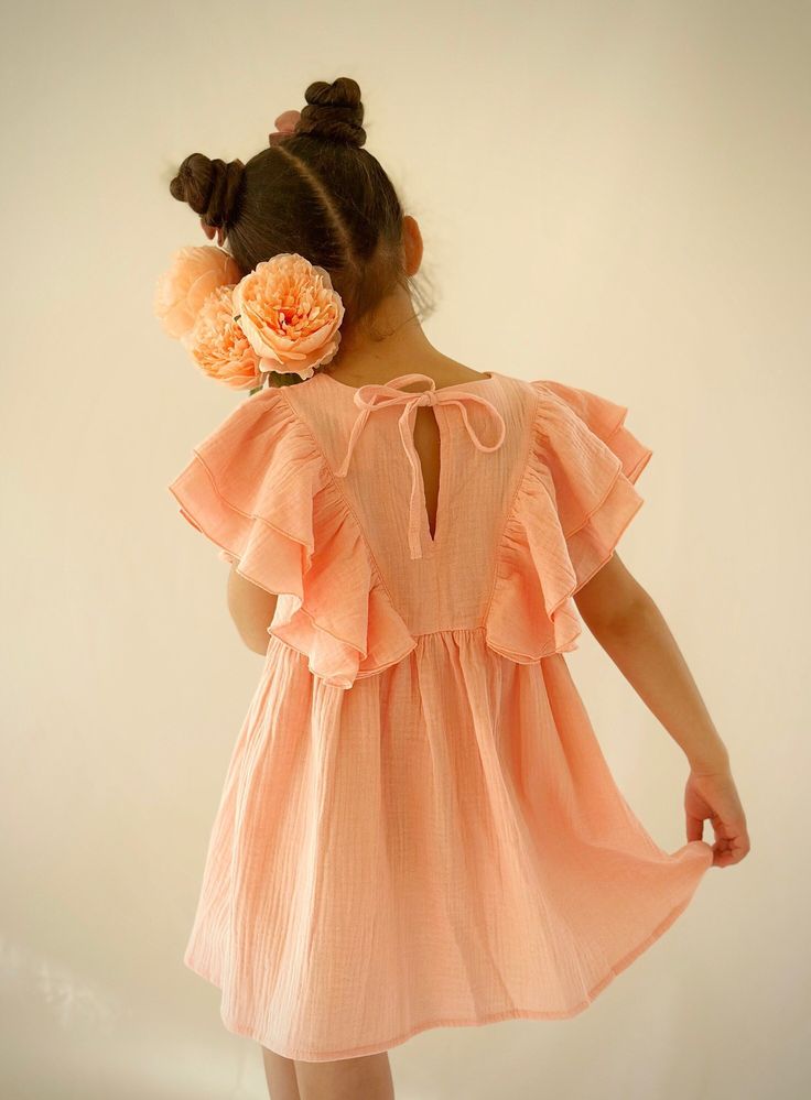 🦋 Step into the sun-kissed days of summer with our enchanting Muslin Flutter Sleeve Dress, the ideal butterfly dress that weaves together the lightness of a butterfly's touch with the comfort your little one craves during those balmy months.  This light and airy boho toddler dress is perfect for a dreamy beach vacation or a special event. Featuring adorable butterfly sleeves and a fun twirly skirt this dress will make any girl feel like a princess. The ideal beach wedding guest dress or birthda Muslin Clothing, Dress Beach Wedding Guest, Butterfly Dresses, Boho Toddler, First Birthday Dress, Beach Wedding Guest, Dreamy Beach, Beach Wedding Guests, Muslin Dress