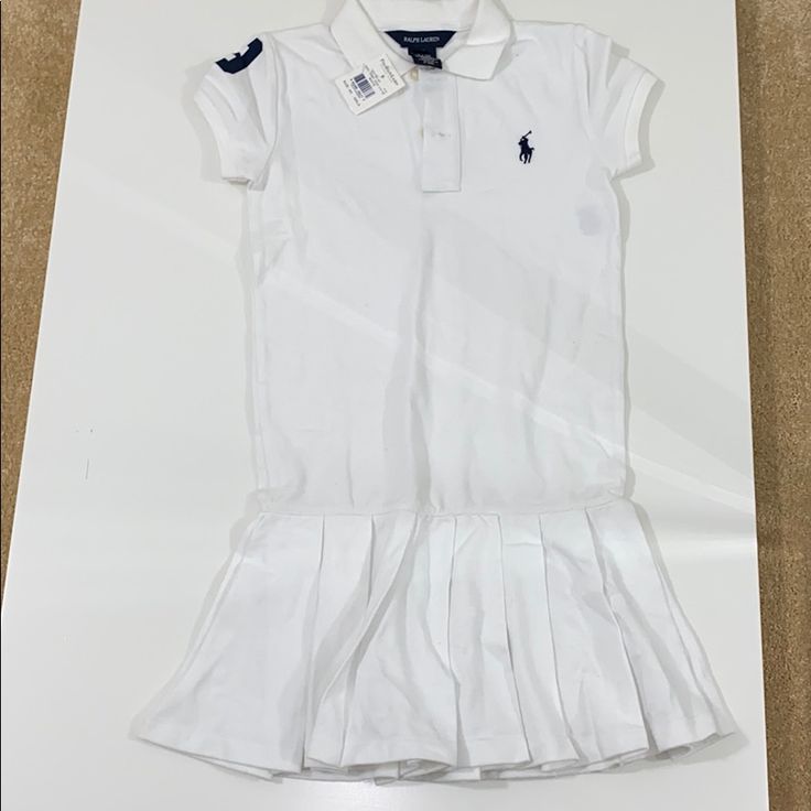 Nwt Kids Polo Pleated Dress Size 6x Solid Color Spring School Dress, White Cotton Tennis Dress For Summer, Spring Fitted Short Sleeve Tennis Dress, Fitted Short Sleeve Tennis Dress For Spring, Spring Short Sleeve Fitted Tennis Dress, Fitted Solid Polo Dress For Spring, White Cotton School Dress, White Cotton Dresses For School, White Fitted Casual Tennis Dress