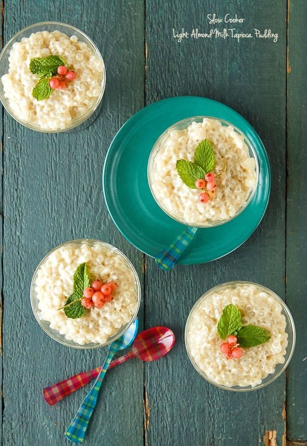 three small bowls filled with oatmeal and garnished with mint leaves