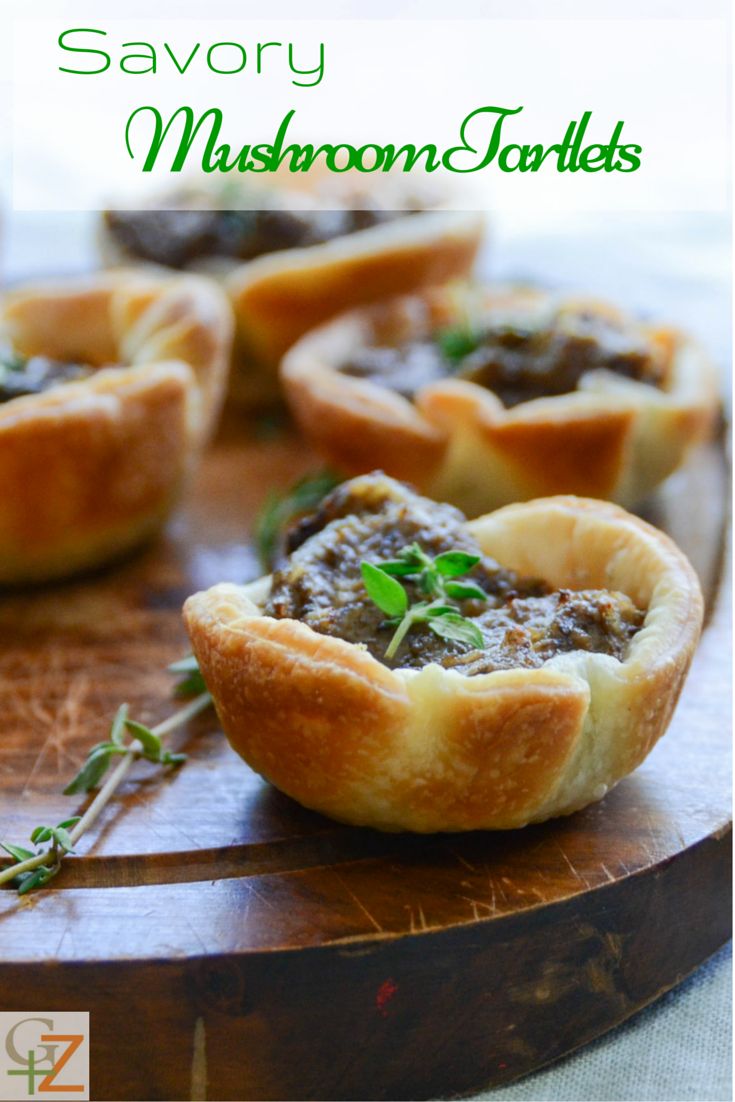 mini mushroom tarts on a cutting board with the title savory mushroom tarts