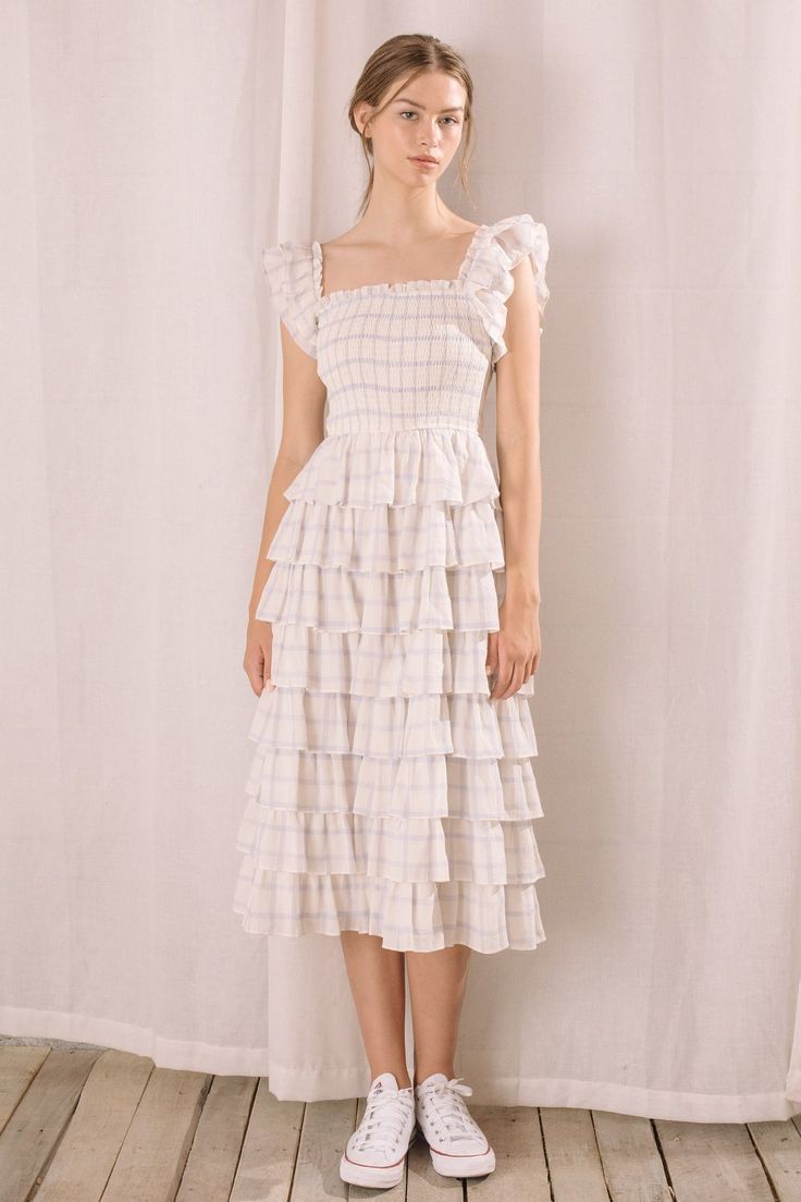 This gingham dress exudes cottage core and romantic elegance. It features a square neckline, smocked fitted upper body, and flounce and ruffled capped sleeves. Its tiered ruffles start at the waist and cascade to mid-length. Comfort and chic style come together to create the perfect look. Material:Polyester Print Midi Dress, Capped Sleeves, Gingham Dress, Gingham Print, Square Necklines, Printed Midi Dress, Cottage Core, Come Together, Square Neckline