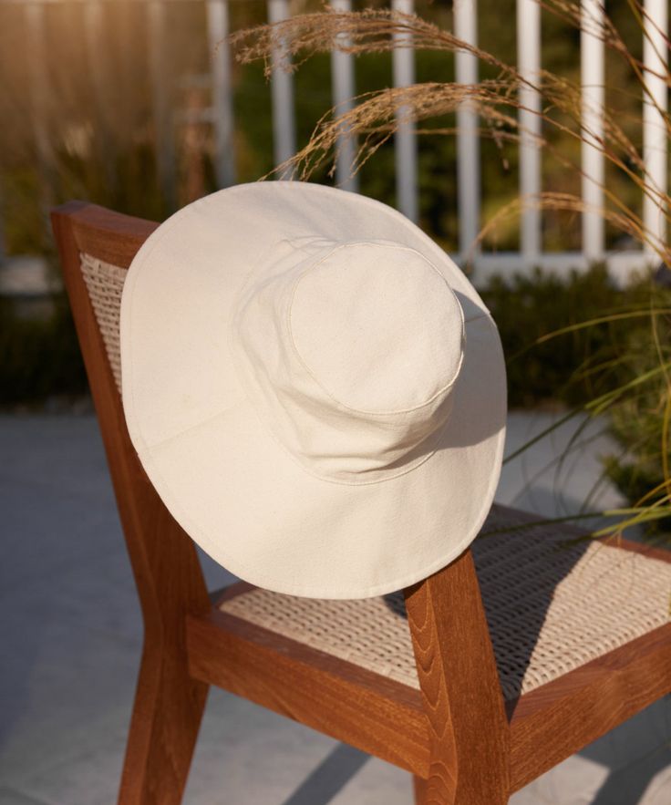 Cotton Canvas Sun Hat Natural This easily packable hat will keep your complexion protected through the sunniest of days. 100% canvas with cotton canvas lining. Made in China. | Jenni Kayne Women's Cotton Canvas Sun Hat Size Medium/Large Packable Hat, Jenni Kayne, Home Logo, Made In China, Sun Hat, Hat Sizes, Sun Hats, Design Details, Cotton Canvas