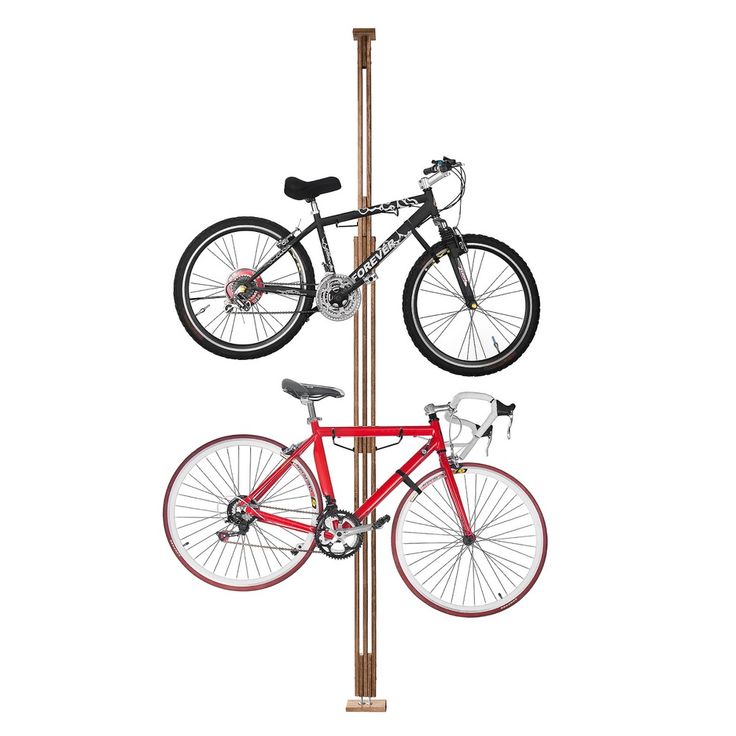 a bike is mounted to a pole with two bicycles on it