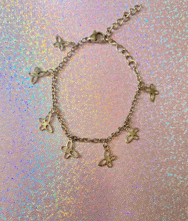 If you love adding butterfly themed stuff to your outfit, then this dainty butterfly charm bracelet is the perfect wear! Made with only stainless steel material, this is a bracelet that won't tarnish nor irritate your skin. Check out our charm bracelets section for more unique designs❤️. *adjustable, reaches up to 6.5 inches (extra length is available at an additional cost). *Butterfly charms are small If you have any questions, please don't hesitate to ask! We are friendly:) Visit our official website: www.yeetincolorboutique.com and follow us on Instagram: @yeetincolorboutique Minimalist Alloy Charm Bracelet Gift, Dainty Hypoallergenic Stainless Steel Bracelets, Dainty Adjustable Stainless Steel Charm Bracelet, Adjustable Dainty Stainless Steel Charm Bracelet, Minimalist Adjustable Alloy Charm Bracelet, Trendy Stainless Steel Charm Bracelet, Adjustable Butterfly Charm Jewelry For Everyday, Adjustable Everyday Jewelry With Butterfly Charm, Trendy Adjustable Stainless Steel Charm Bracelet