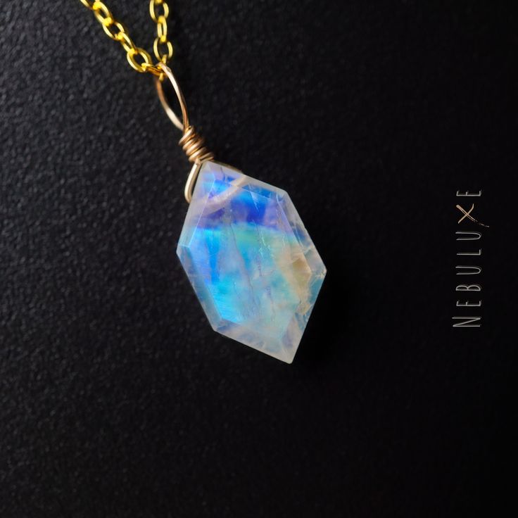 🌈 Our Rainbow Moonstone necklace, with its stunning iridescent hues is a perfect accessory to add a touch of magic to your outfit, and is the perfect gift for June birthdays. Allow Rainbow Moonstone to guide you towards a fresh start, filling your life with hope and endless possibilities 💎 ⭒ Chain Material: 925 Sterling Silver ⭒ Chain Length: 16-18" / 18-20" Inches ⭒ Finish: Silver * Gold * Rose Gold ⭒ Gemstone Size: 10x15mm  ⭒ Each necklace comes with a crystal information card & stylish bran Minimalist Moonstone Pendant Crystal Necklace, Minimalist Moonstone Crystal Pendant Necklace, Mystical Iridescent Moonstone Jewelry, Minimalist Moonstone Crystal Necklace For Healing, Celestial Moonstone Necklace With Wire Wrapped Details, Celestial Moonstone Wire Wrapped Necklaces, Celestial Moonstone Wire Wrapped Necklace, Iridescent Moonstone Pendant Jewelry, Celestial Wire Wrapped Moonstone Necklace