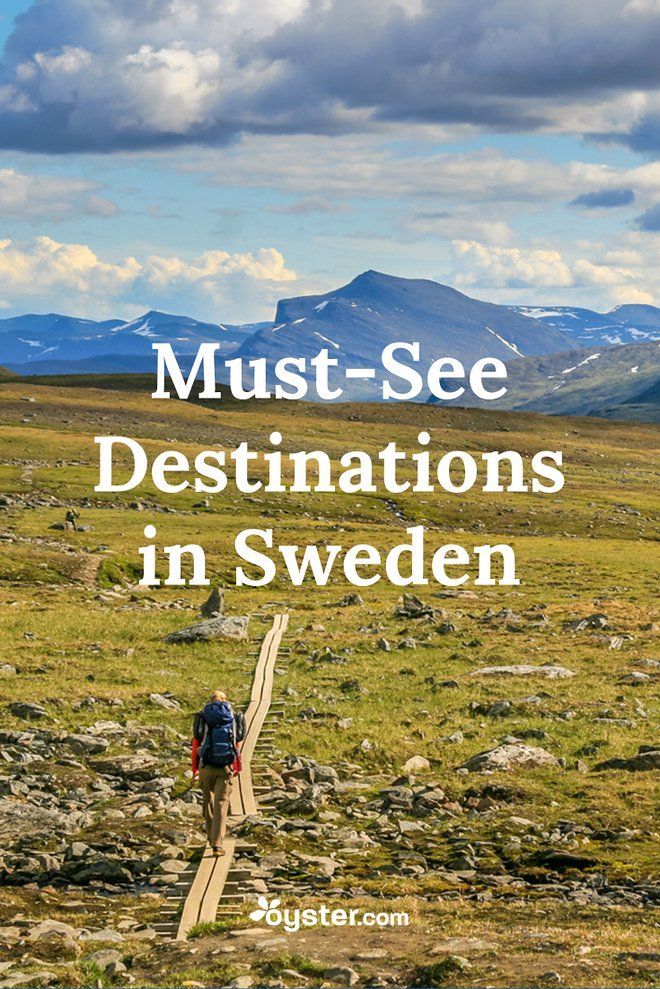 a person walking down a path in the mountains with text overlay that reads must see destinations in sweden