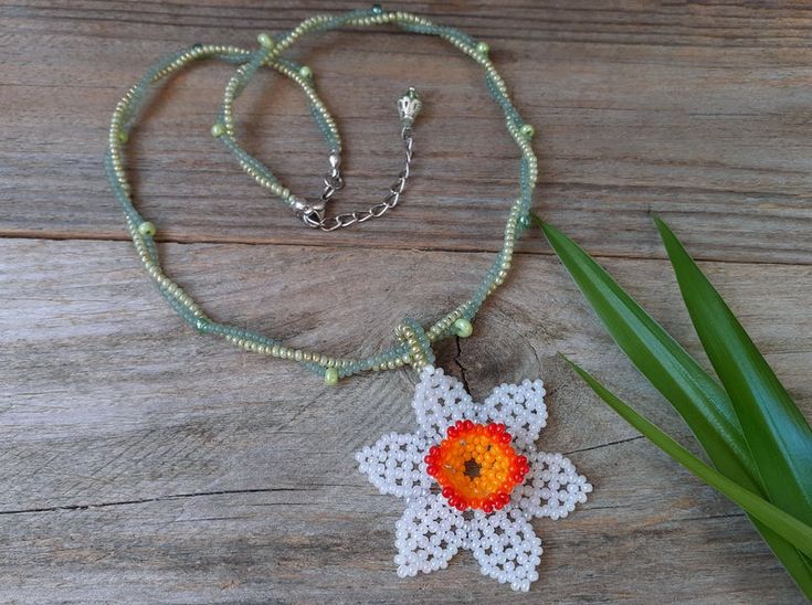 Beaded Daffodil necklace Huichol white flower pendant for | Etsy Beaded Daffodil, Daffodil Necklace, Jewelry For Bridesmaids, Hippie Bride, Original Necklace, Blue Beaded Bracelets, Daffodil Flower, Crystal Bags, Floral Jewelry