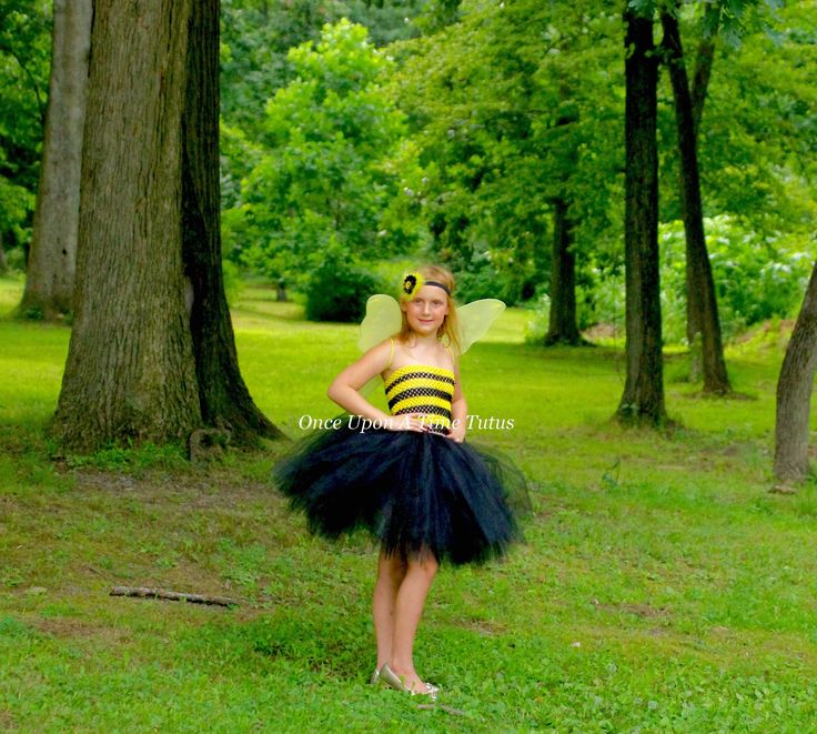 Bumble Bee Tutu Dress This gorgeous dress is made from a striped black and yellow unlined crochet top and black tulle, which is perfect for Halloween costumes, pageants, birthdays and more! Wings and headband are included! Great for baby showers, photo props, portraits, special occasions, and birthdays! Sizes: Length noted is length of skirt portion only. All tops are approximately 8 inches long. 12M - 2T 8 Inches long 3T - 4T 10 inches long 5 - 6 12 Inches Long 7-8 14 Inches Long Costume will b Birthday Dress Kids, Bumblebee Birthday, Kids Tutu Dress, Etsy Halloween, Kids Tutu, Toddler Tutu, Birthday Girl Dress, Black Tulle, Birthday Dress