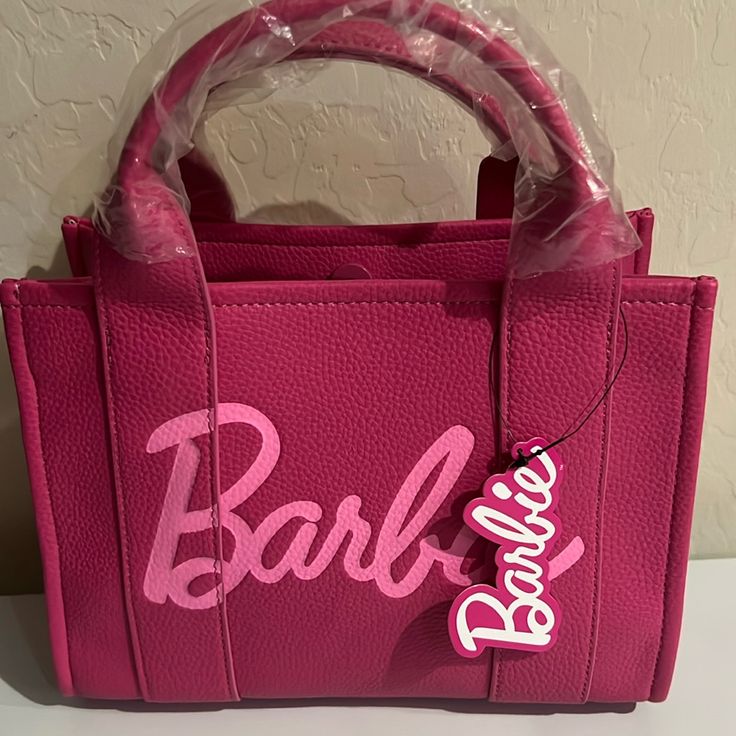 Barbie Limited Edition Small Tote/Shoulder Bag With Strap Very Cute Brand New. Bag With 2 Side Pockets, 1 Side With Zipper And Other Side Without Zipper. Please See Pictures As Part Of The Descriptions And Blow Them Up For A Closer Look . Sold As Is! Limited Exclusive Polyurethane; Polyester Approx. 10" W X 8" H X 4 1/2" D Gold Chanel Bag, Barbie Limited Edition, Im A Barbie Girl, Barbie Party, Pink Girly Things, Barbie Accessories, Girly Accessories, Summer Gifts, Pretty Bags