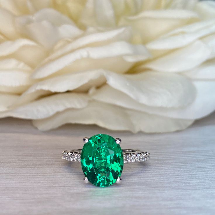 Emerald And Genuine Diamond Engagement Ring for Ladies, Oval Emerald and Moissanite Wedding Ring For Her, Moissanite Ring 14k Gold, #7083 #OvalEmeraldRing #MoissaniteRing #DiamondRing #EmeraldAndDiamond #14kWhiteGoldRing #LadiesRing #AnniversaryRing #EngagementRing #RingForHer #WeddingRing Oval Tsavorite Diamond Ring For Formal Occasions, Oval Emerald Birthstone Ring In Fine Jewelry Style, Brilliant Cut Oval Diamond Ring With Tsavorite, Oval Tsavorite Ring With Center Stone, Classic Oval Tsavorite Ring, Gia Certified Oval Green Diamond Ring, Oval Tsavorite Jewelry With Accent Stones, Green Oval Diamond Ring With Center Stone, Oval Brilliant Cut Emerald Ring