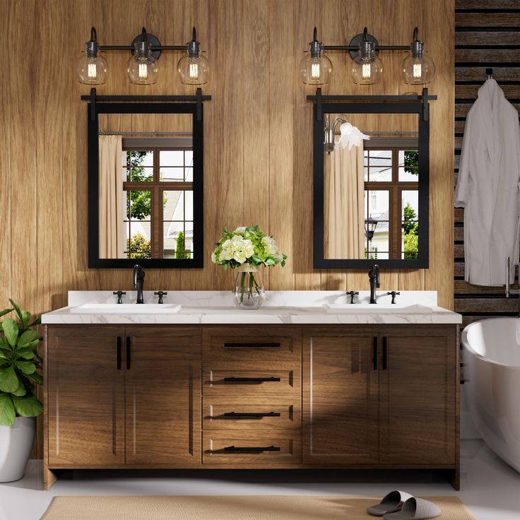 a bathroom with two sinks, mirrors and a bathtub in the middle of it