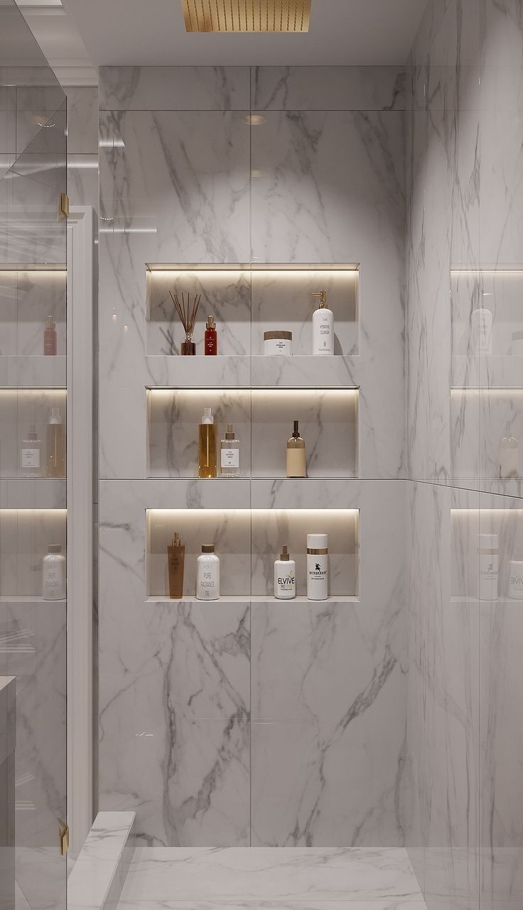 a bathroom with marble walls and shelves filled with personal care items