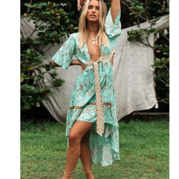 Floral Print Cut Out Plunging Neckline Maxi Dress Pre-Order Flowy Midi Dress For Spring Beach Cover-up, Green V-neck Beachy Maxi Dress, V-neck Floral Print Beach Dress For Brunch, Floral Print V-neck Dress For Beach Party, Green V-neck Beach Dress, Beachy V-neck Maxi Dress For Day Out, Beach Season V-neck Midi Dress, Green V-neck Midi Dress For Beach, Chic V-neck Dress For Beach Party