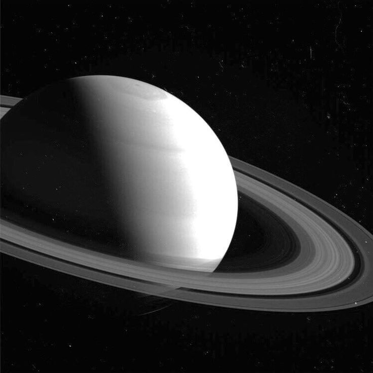 saturn as seen by the hubpler telescope in black and white, with its rings showing