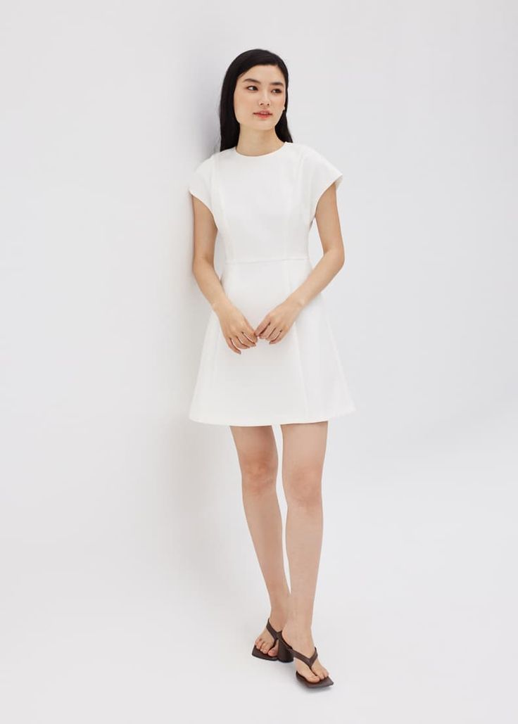 Alecia Classic A-line Dress | Love, Bonito US Fitted A-line Mini Dress For Day Out, A-line Mini Dress With Fitted Bodice For Casual Wear, Elegant A-line Mini Dress For Casual Occasions, Feminine A-line Dress With Flattering Silhouette, Flattering A-line Cocktail Dress, Classic Fit And Flare A-line Mini Dress, Chic A-line Midi Dress With Flattering Cut, Classic A-line Spring Dress, Flattering Fit And Flare Knee-length Mini Dress