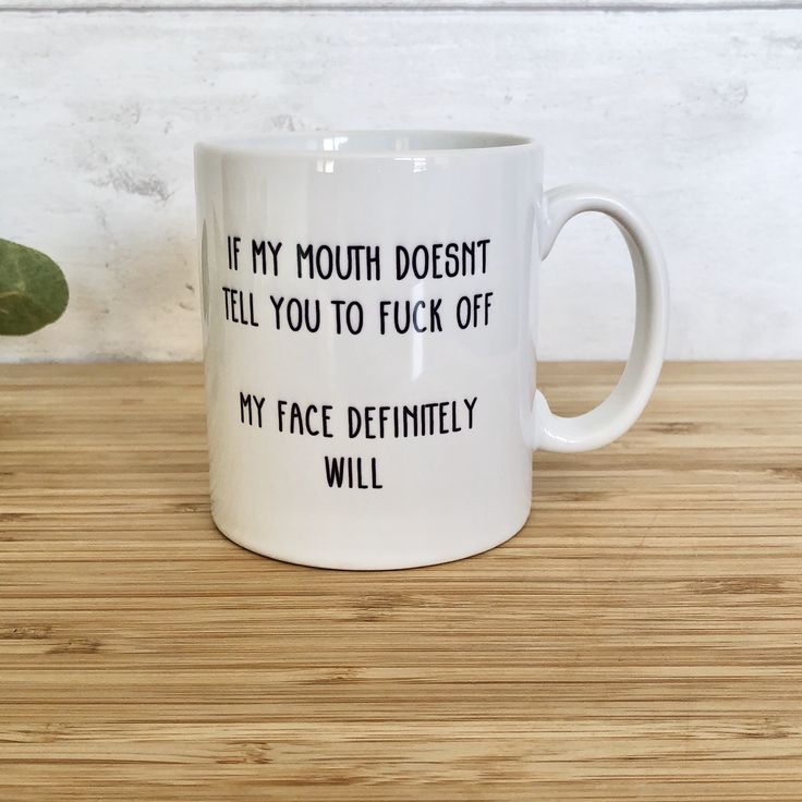 a white coffee mug with the words if my mouth doesn't tell you to flick off, my face definitely will