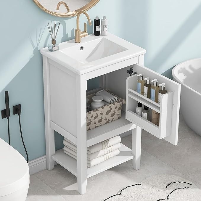 a bathroom with a sink, toilet and bathtub next to a wall mounted mirror