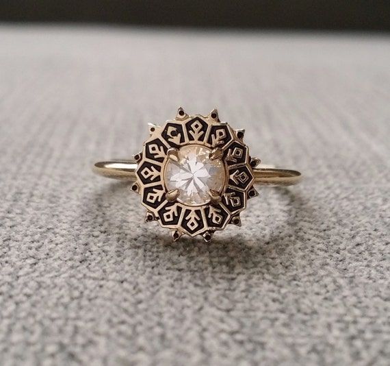 Hey, I found this really awesome Etsy listing at https://www.etsy.com/listing/692084386/antiqued-white-sapphire-filigree Ornate Ring, Isaiah 54, Antique Diamond Engagement Rings, Engagement Ring Art Deco, Antique Filigree, Filigree Engagement Ring, Edwardian Art, Edwardian Jewelry, Ringe Gold