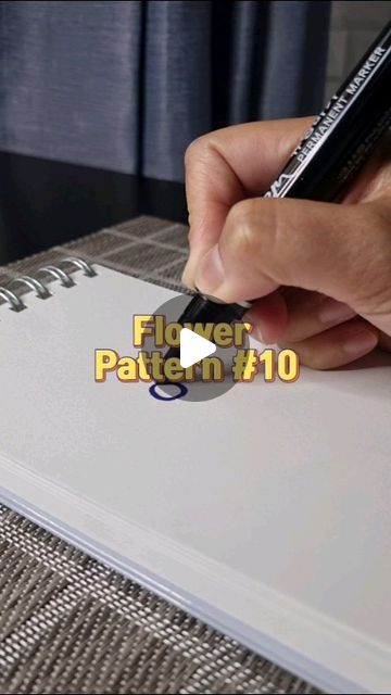 a person writing on a piece of paper with a pen in their hand and the words flier pattern f10 below it