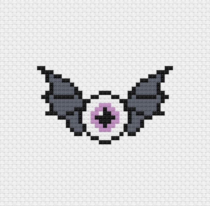 an image of a cross stitched eye with pink and black irises on it