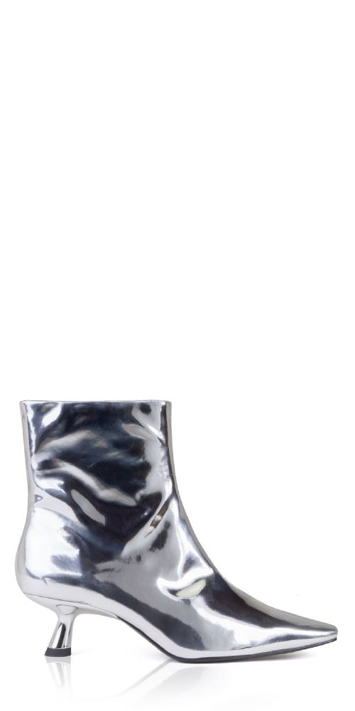 Upgrade your wardrobe with the sleek and stylish Simon Miller Kuki Ankle Boot. Made from metallic chrome silver leather, it features a classic pointed toe and sculptural kitten heel for a timeless yet modern look. Elevate any outfit with this must-have addition. Details: Color: Chrome 100% leather Heel height: 5cm/2in Boot shaft: 16cm Vendor Code: F171-9137 Zip closure Fits true to size; European sizing Elegant Metallic Boots With Pointed Toe, Glamorous Metallic Pointed Toe Boots, Chic Metallic Heeled Boots For Formal Occasions, Chic Metallic Boots For Formal Occasions, Chic Metallic Boots For Formal Events, Modern Silver Low Heel Heels, Modern Metallic Heels In Metallic Leather, Modern Metallic Heels, Metallic Leather Heeled Boots With Pointed Toe