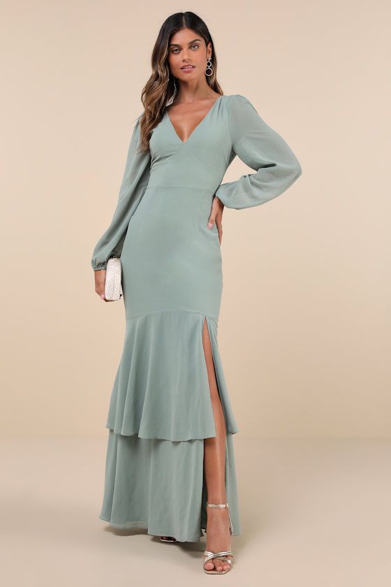 Tier Elegance Sage Brush Long Sleeve Tiered Maxi Dress Sage Green Bridesmaid Dresses Long Sleeve, Chic Fitted Chiffon Dress For Wedding Guest, Elegant Flowy Chiffon V-neck Dress, Chiffon V-neck Dress For Date Night, Elegant Flowy V-neck Dress, Chic Fitted Chiffon V-neck Dress, Elegant Fitted Chiffon Dress For Date Night, Flowy V-neck Maxi Dress For Gala, Elegant Green Maxi Length Chiffon Dress