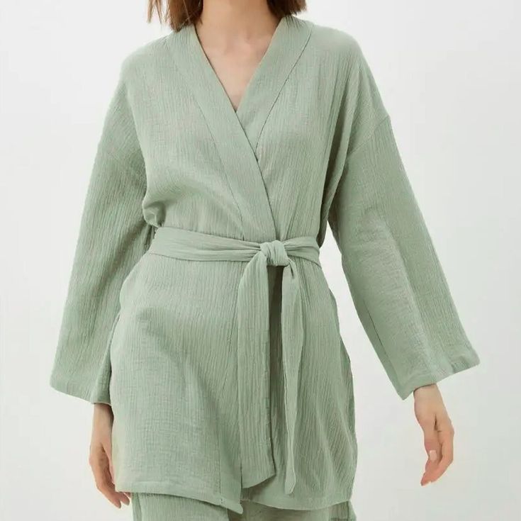 Gauze Muslin Robe, a perfect addition to your loungewear collection. Crafted with care from the finest cotton muslin, this exquisite kimono bathrobe is designed to envelop you in softness and style. * All clothing made from European muslin (100% cotton) * OEKO-TEX certified fabric (no harmful chemicals used in production) * Long sleeves  * From XS to Plus size TAKING CARE: * machine wash gentle (30- 40 C/ 104 F) * dry gentle. * do not bleach. Each order is sewn with love and attention to detail especially for you. Cotton Sleepwear With Kimono Sleeves For Loungewear, Cotton Sleepwear With Kimono Sleeves, Chic Wrap Kimono For Daywear, Tie Waist Kimono For Loungewear, Cotton Sleepwear With Kimono Sleeves For Relaxation, Chic Long Sleeve Loungewear Robe, Spring Wrap Kimono For Daywear, Spring Daywear Wrap Kimono, Elegant Summer Relaxation Kimono